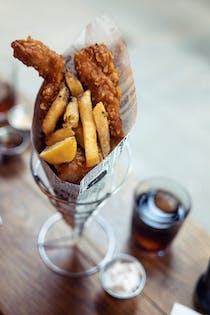 Enjoy fish and chips at Off The Hook