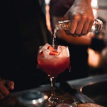 Enjoy a drink by the beach at The Butterfly Beach Club