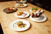 Enjoy a delicious meal at Priory Tavern Kilburn