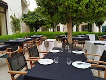 Dine on the terrace at Restaurante Don Giovanni Finca Cortesin