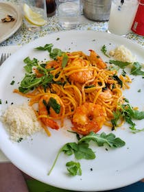 Try the delicious pasta at Restaurante Pizzaria Piu Bella