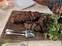 Sample the steak at Osteria del Sole