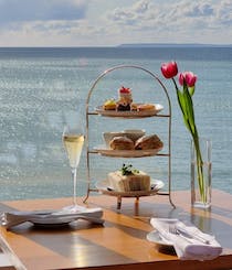Enjoy an afternoon tea with a view at Watersmeet Hotel