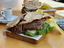 Taste the Traditional Prego no Bolo do Caco at Casa do Bolo do Caco