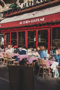 Enjoy a meal at Au chien qui Fume