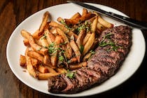 Enjoy a steak and chips at Manor Inn