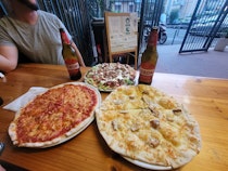 Enjoy authentic Roman pizza at Pizzeria del Fontanile