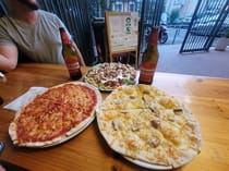 Enjoy authentic Roman pizza at Pizzeria del Fontanile
