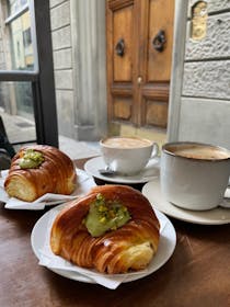 Enjoy coffee and pastries at Ala Grande Caffè