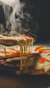 Indulge in delicious pizza at Carpe Diem