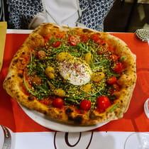 Feast on pizza at Pizzeria Mon Amour
