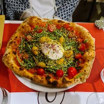 Feast on pizza at Pizzeria Mon Amour