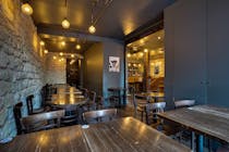 Enjoy a glass of wine in this La Maison Bar