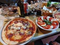 Enjoy mouthwatering pizza and desserts at Bar Ristorante Pizzeria Il Baccanale