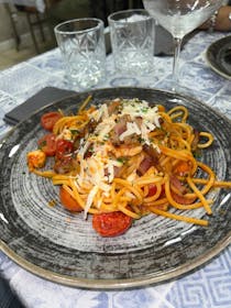 Indulge in pasta dishes at Pescheria In Alto Mare