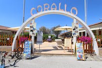 Enjoy a beachside meal at Bagno Ristorante Corallo
