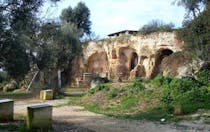 Explore the ancient village at Parco rupestre Lama d'Antico