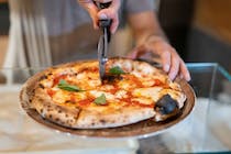 Grab a slice at Antica Roma Pizzeria