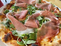 Enjoy Pizza Mania's high-end pizzas