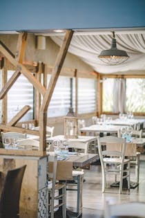 Share a leisurely meal at Ristorante Pizzeria Delfino Blu
