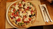 Enjoy delicious pizza at Il Piccio