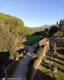Explore the historic gardens and ruins at Villa Sforza Cesarini