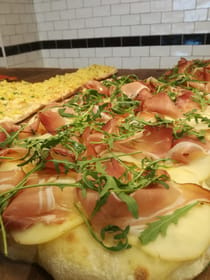 Enjoy Delicious Pizza at Grano