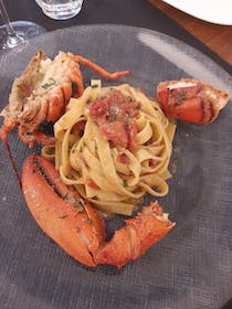 Enjoy the seafood pasta at Ristorante La Casa Rossa