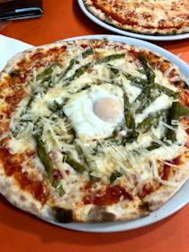Indulge in the excellent pizzas at Quality Pizza