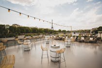 Admire the sunset at Monsieur Mouche