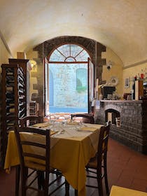 Savour local dishes and wine at Antica Trattoria La Toppa