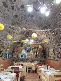 Enjoy the atmosphere and great dishes at Ristorante La Grotta