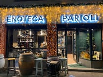 Browse the liquors and enjoy an aperitif at Enoteca Parioli