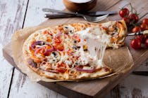 Try the pizza at Casa La Corte