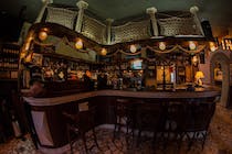 Grab a drink at Palmares Club Irish Pub