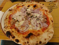 Dine at Pizzeria Trimalchione