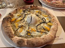 Share a couple of pizzas at Spicchi d'Arte