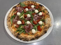 Sample the pizza at Gusti