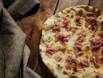 Dine at La Grottella