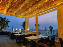 Dine with a sunset view at Trattoria Maestrale