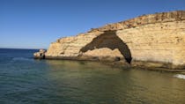 Explore the clifftops of Praia da Cama da Vaca