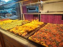 Savour authentic pizza at Pizza Gege' Corso di Francia