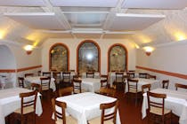 Eat in a classic trattoria at Flavio al Velavevodetto