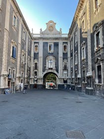 Explore the ancient Porta Uzeda