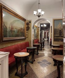 Have coffee in a historic cafe at Caffè Greco