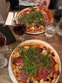 Enjoy authentic pizza at Dell'Angolo Pizzeria