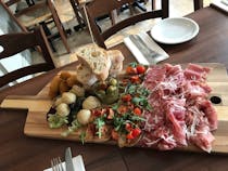 Try the platters at La Pernella