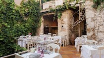 Enjoy a courtyard meal at Castelo Restaurant