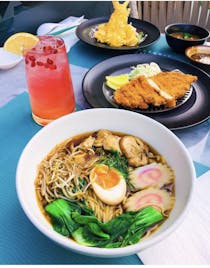 Try the ramen at Sushi Library Festival Plaza