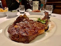Order steak at The Butcher Shop & Grill